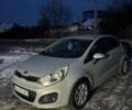 Серый Киа Рио, объемом двигателя 1.12 л и пробегом 220 тыс. км за 5750 $, фото 2 на Automoto.ua