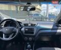 Сірий Кіа Ріо, об'ємом двигуна 1.4 л та пробігом 62 тис. км за 7690 $, фото 12 на Automoto.ua