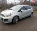 Серый Киа Рио, объемом двигателя 1.12 л и пробегом 212 тыс. км за 5900 $, фото 1 на Automoto.ua