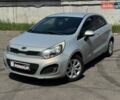 Сірий Кіа Ріо, об'ємом двигуна 1.12 л та пробігом 224 тис. км за 5999 $, фото 2 на Automoto.ua