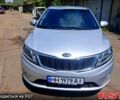Серый Киа Рио, объемом двигателя 1.6 л и пробегом 240 тыс. км за 7400 $, фото 2 на Automoto.ua