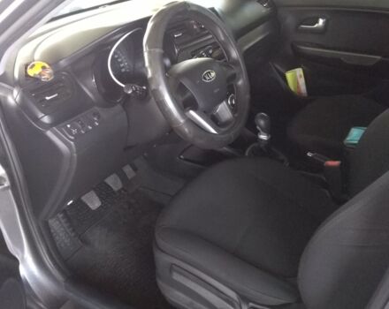 Серый Киа Рио, объемом двигателя 1.4 л и пробегом 77 тыс. км за 9500 $, фото 2 на Automoto.ua