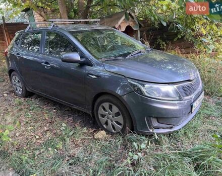 Серый Киа Рио, объемом двигателя 1.4 л и пробегом 205 тыс. км за 5400 $, фото 1 на Automoto.ua