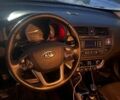 Серый Киа Рио, объемом двигателя 1.12 л и пробегом 220 тыс. км за 5750 $, фото 8 на Automoto.ua