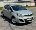 Сірий Кіа Ріо, об'ємом двигуна 1.12 л та пробігом 224 тис. км за 5999 $, фото 1 на Automoto.ua