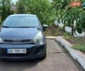 Серый Киа Рио, объемом двигателя 1.12 л и пробегом 198 тыс. км за 6400 $, фото 1 на Automoto.ua