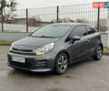 Серый Киа Рио, объемом двигателя 1.4 л и пробегом 85 тыс. км за 10999 $, фото 1 на Automoto.ua
