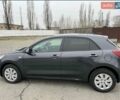 Сірий Кіа Ріо, об'ємом двигуна 1.4 л та пробігом 91 тис. км за 12000 $, фото 1 на Automoto.ua