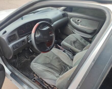 Серый Киа Рио, объемом двигателя 1.8 л и пробегом 250 тыс. км за 1350 $, фото 4 на Automoto.ua