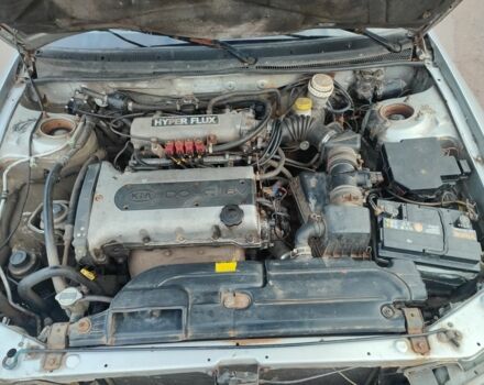 Серый Киа Рио, объемом двигателя 1.8 л и пробегом 250 тыс. км за 1350 $, фото 5 на Automoto.ua