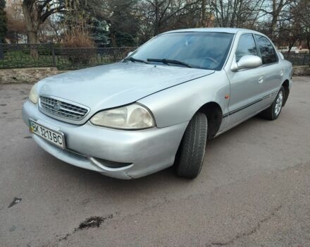 Серый Киа Рио, объемом двигателя 1.8 л и пробегом 250 тыс. км за 1350 $, фото 1 на Automoto.ua