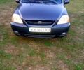 Серый Киа Рио, объемом двигателя 1.5 л и пробегом 185 тыс. км за 2800 $, фото 1 на Automoto.ua