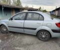 Серый Киа Рио, объемом двигателя 1.4 л и пробегом 384 тыс. км за 4300 $, фото 1 на Automoto.ua