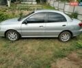 Серый Киа Рио, объемом двигателя 1.4 л и пробегом 300 тыс. км за 2000 $, фото 1 на Automoto.ua