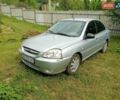 Серый Киа Рио, объемом двигателя 1.4 л и пробегом 300 тыс. км за 2000 $, фото 2 на Automoto.ua