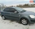 Серый Киа Рио, объемом двигателя 1.4 л и пробегом 307 тыс. км за 5100 $, фото 2 на Automoto.ua
