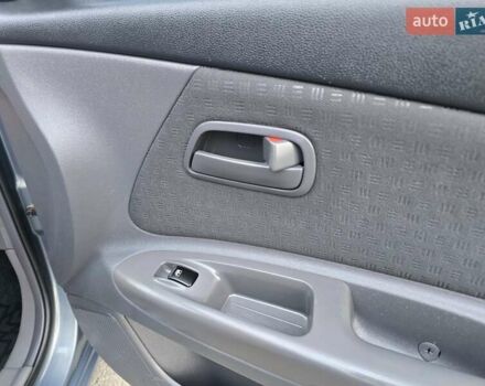 Серый Киа Рио, объемом двигателя 1.4 л и пробегом 153 тыс. км за 5499 $, фото 39 на Automoto.ua
