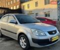 Серый Киа Рио, объемом двигателя 1.4 л и пробегом 238 тыс. км за 5500 $, фото 1 на Automoto.ua