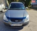 Сірий Кіа Ріо, об'ємом двигуна 1.4 л та пробігом 221 тис. км за 4300 $, фото 1 на Automoto.ua