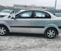 Серый Киа Рио, объемом двигателя 1.4 л и пробегом 244 тыс. км за 4500 $, фото 12 на Automoto.ua