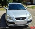 Серый Киа Рио, объемом двигателя 1.4 л и пробегом 180 тыс. км за 4500 $, фото 1 на Automoto.ua