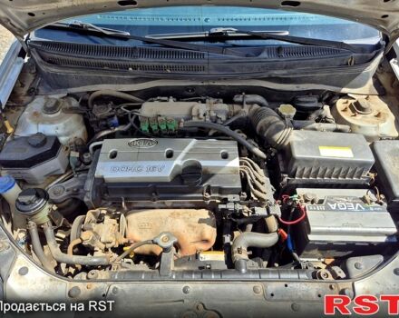 Серый Киа Рио, объемом двигателя 1.4 л и пробегом 180 тыс. км за 4500 $, фото 12 на Automoto.ua