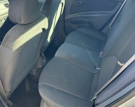 Серый Киа Рио, объемом двигателя 1.4 л и пробегом 244 тыс. км за 2900 $, фото 14 на Automoto.ua