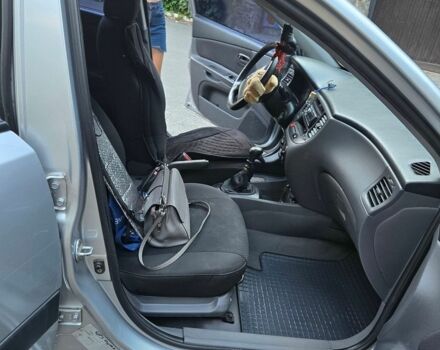 Сірий Кіа Ріо, об'ємом двигуна 1.6 л та пробігом 194 тис. км за 3800 $, фото 4 на Automoto.ua