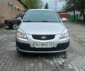 Серый Киа Рио, объемом двигателя 1.4 л и пробегом 240 тыс. км за 3950 $, фото 2 на Automoto.ua