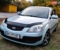 Серый Киа Рио, объемом двигателя 1.4 л и пробегом 176 тыс. км за 4600 $, фото 2 на Automoto.ua