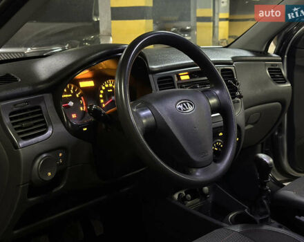 Серый Киа Рио, объемом двигателя 1.4 л и пробегом 220 тыс. км за 3400 $, фото 11 на Automoto.ua