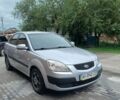 Серый Киа Рио, объемом двигателя 1.4 л и пробегом 240 тыс. км за 3950 $, фото 1 на Automoto.ua