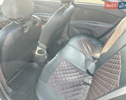 Серый Киа Рио, объемом двигателя 1.4 л и пробегом 297 тыс. км за 4500 $, фото 4 на Automoto.ua