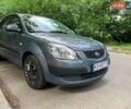 Серый Киа Рио, объемом двигателя 1.4 л и пробегом 141 тыс. км за 5200 $, фото 1 на Automoto.ua