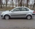 Серый Киа Рио, объемом двигателя 1.4 л и пробегом 247 тыс. км за 3700 $, фото 1 на Automoto.ua