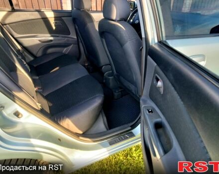 Сірий Кіа Ріо, об'ємом двигуна 1.4 л та пробігом 230 тис. км за 5200 $, фото 6 на Automoto.ua