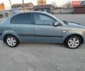 Серый Киа Рио, объемом двигателя 1.6 л и пробегом 140 тыс. км за 4490 $, фото 1 на Automoto.ua