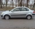 Серый Киа Рио, объемом двигателя 1.4 л и пробегом 247 тыс. км за 3700 $, фото 1 на Automoto.ua