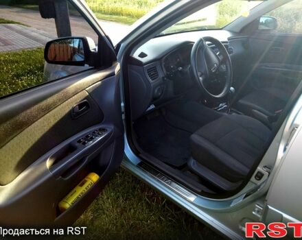 Сірий Кіа Ріо, об'ємом двигуна 1.4 л та пробігом 230 тис. км за 5200 $, фото 8 на Automoto.ua