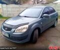 Серый Киа Рио, объемом двигателя 1.4 л и пробегом 198 тыс. км за 3550 $, фото 1 на Automoto.ua