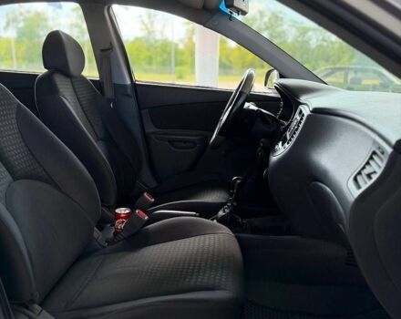 Серый Киа Рио, объемом двигателя 1.4 л и пробегом 243 тыс. км за 4200 $, фото 10 на Automoto.ua