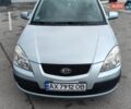 Серый Киа Рио, объемом двигателя 1.4 л и пробегом 240 тыс. км за 4400 $, фото 1 на Automoto.ua