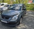 Серый Киа Рио, объемом двигателя 1.4 л и пробегом 169 тыс. км за 4500 $, фото 1 на Automoto.ua