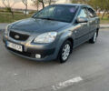 Серый Киа Рио, объемом двигателя 1.4 л и пробегом 209 тыс. км за 4799 $, фото 1 на Automoto.ua