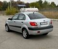 Сірий Кіа Ріо, об'ємом двигуна 1.4 л та пробігом 246 тис. км за 4300 $, фото 5 на Automoto.ua