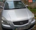 Серый Киа Рио, объемом двигателя 1.4 л и пробегом 232 тыс. км за 3200 $, фото 1 на Automoto.ua