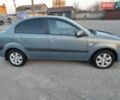 Серый Киа Рио, объемом двигателя 1.6 л и пробегом 140 тыс. км за 4700 $, фото 1 на Automoto.ua