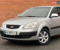 Серый Киа Рио, объемом двигателя 1.4 л и пробегом 179 тыс. км за 4250 $, фото 1 на Automoto.ua