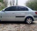 Сірий Кіа Ріо, об'ємом двигуна 1.5 л та пробігом 200 тис. км за 5100 $, фото 1 на Automoto.ua