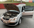 Серый Киа Рио, объемом двигателя 1.4 л и пробегом 179 тыс. км за 3999 $, фото 25 на Automoto.ua